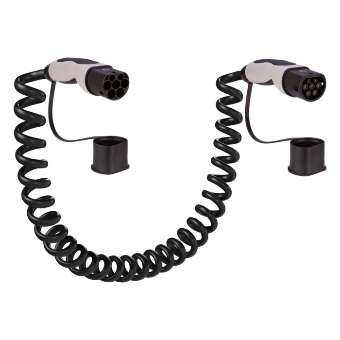 Cavo a spirale nero t.b.t. per auto elettriche con due spine e cappucci protettivi.