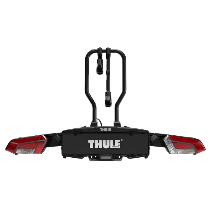 Portabici Thule per auto, montaggio su gancio traino, con luci posteriori.