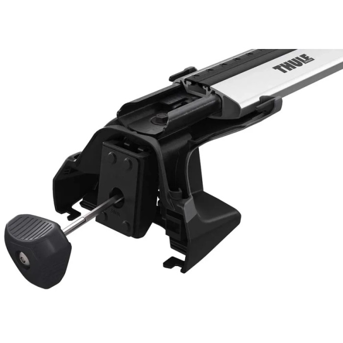 Dettaglio di un accessorio portapacchi Thule per il montaggio sul tetto del veicolo.