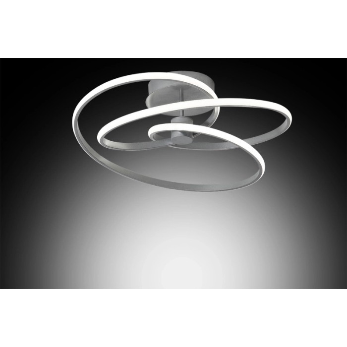 Plafoniera LED moderna t.b.t. con elementi luminosi curvi e brillanti.