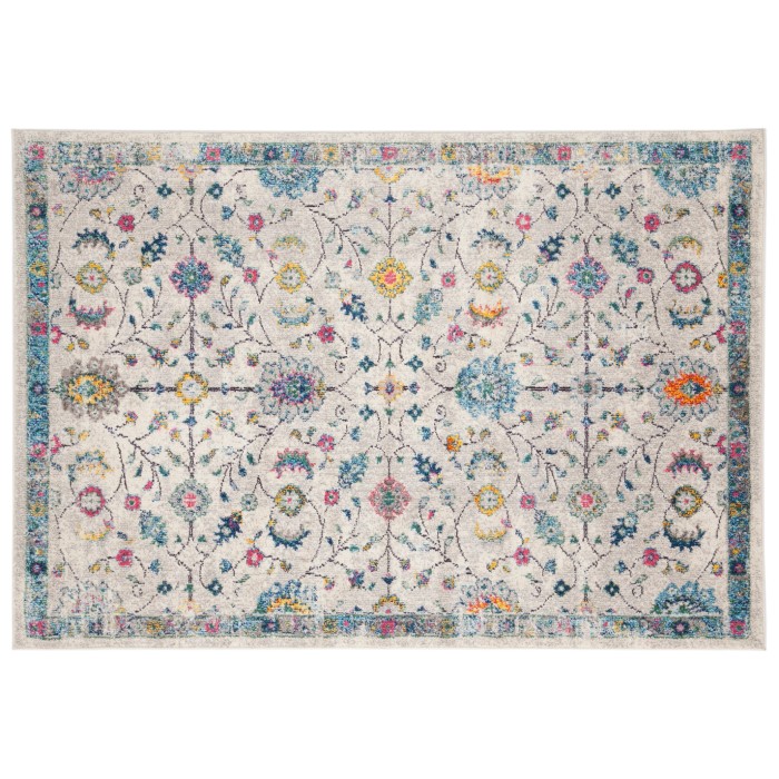 Tappeto vintage con motivo floreale in grigio, blu, giallo e rosa.