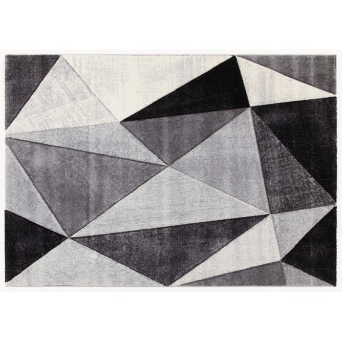 Tappeto moderno con motivo geometrico a triangoli in tonalità di grigio e nero.