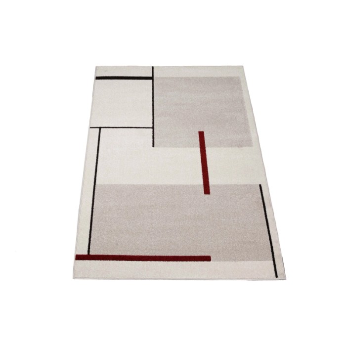 Tappeto moderno con motivo geometrico in beige, grigio e nero.