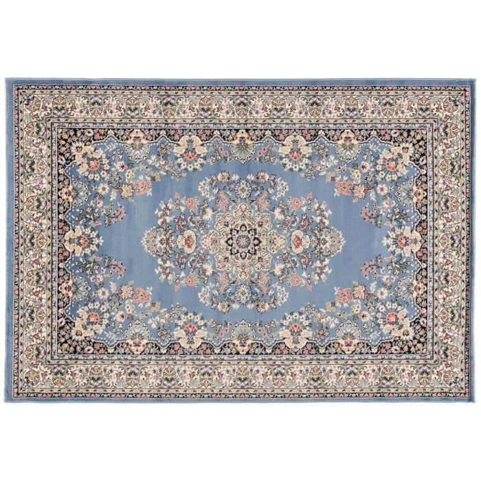 Tappeto blu con motivo floreale, ideale per ambienti moderni.