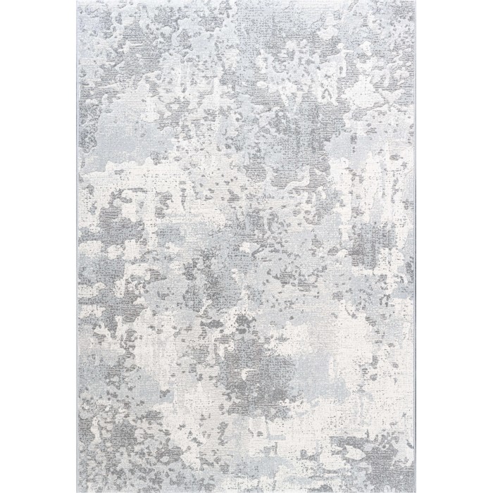 Tappeto moderno con motivo astratto nei toni del grigio e bianco.