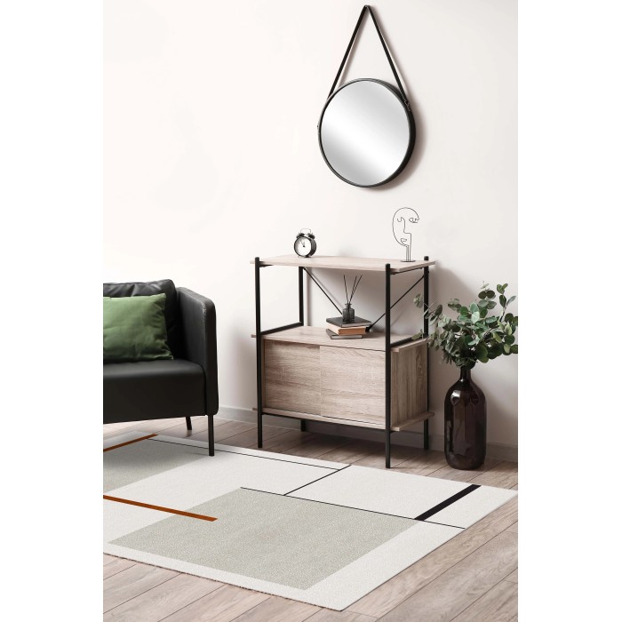 Tappeto moderno con motivo geometrico, abbinato a mobili da soggiorno.