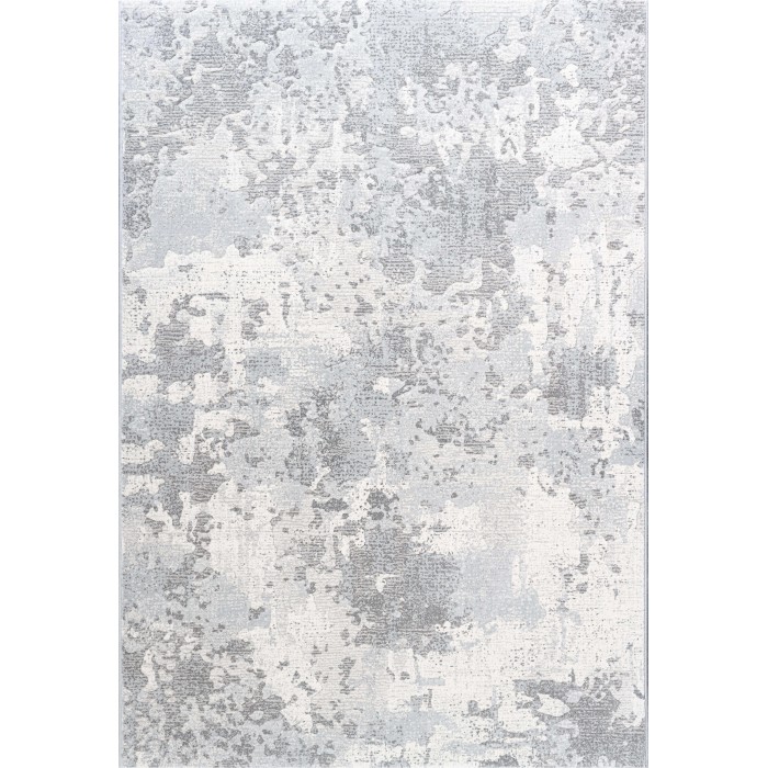 Tappeto moderno con motivo astratto nei toni del grigio e bianco.