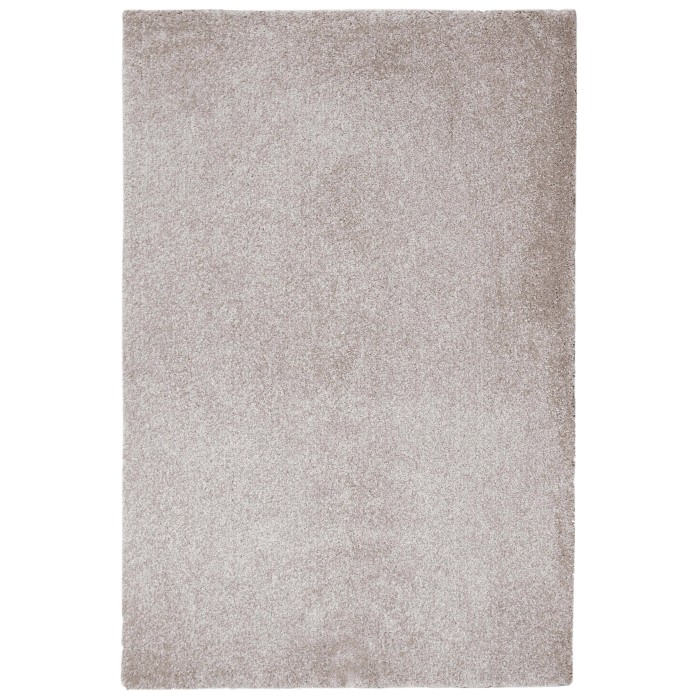 Tappeto beige a pelo corto. Tappeto morbido e tinta unita per spazi abitativi.