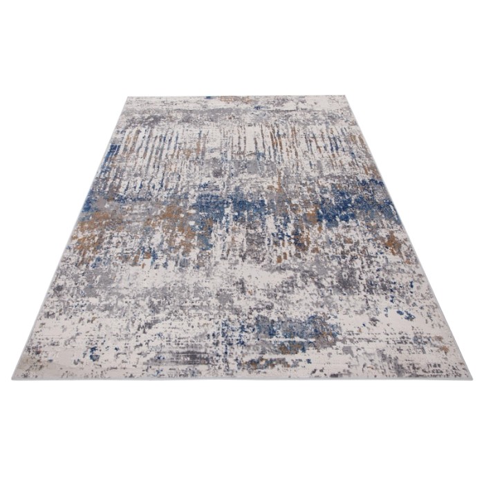 Tappeto moderno con motivo astratto in blu, grigio e beige.
