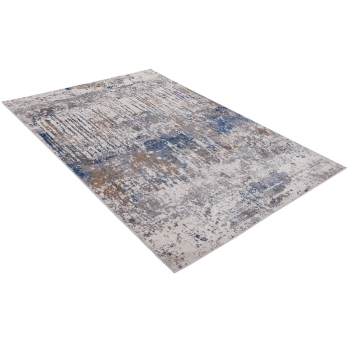 Tappeto moderno con motivo astratto in blu, grigio e beige.