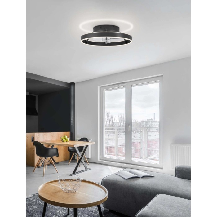 Plafoniera LED moderna t.b.t. in nero, design circolare per un'illuminazione elegante.