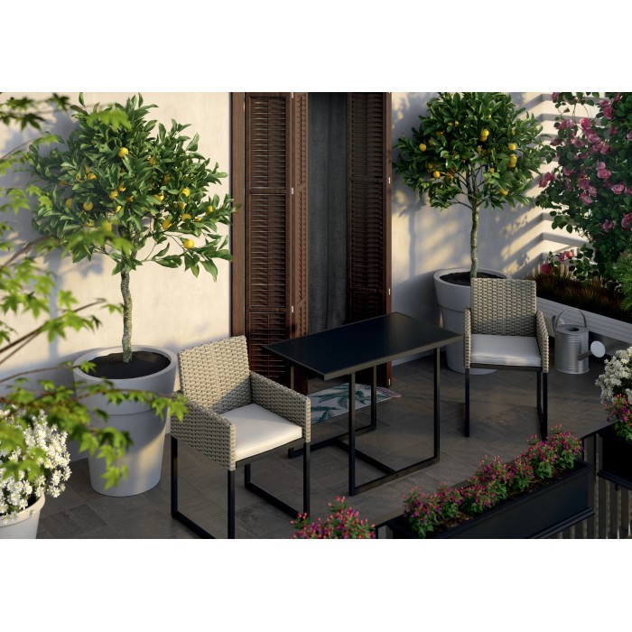 Set di mobili da giardino t.b.t. con tavolo e due sedie su un balcone.