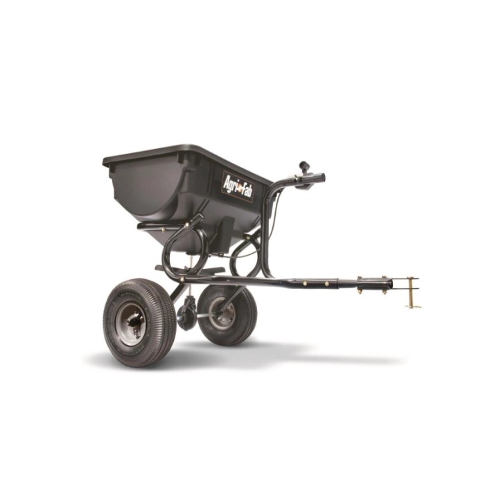 Spargitore trainato universale MTD con capacità di 39 kg per trattorini.