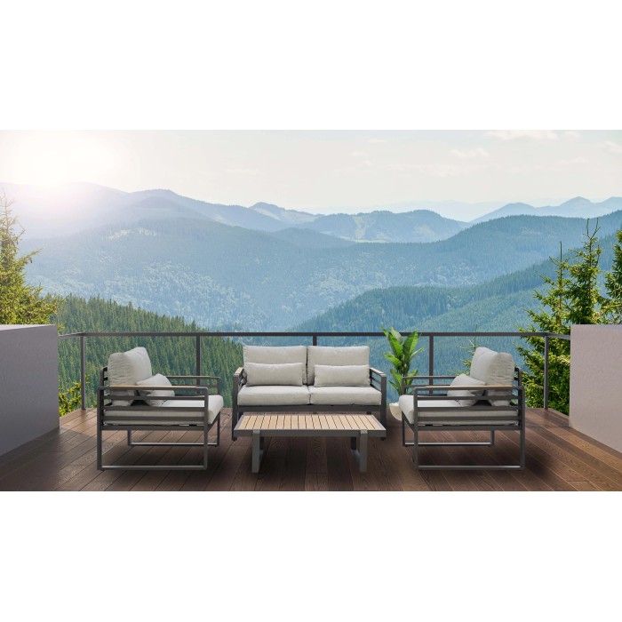 Set di mobili da giardino t.b.t. con divano, poltrone e tavolo con vista sulle montagne.