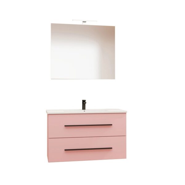 Mobile bagno rosa con specchio e rubinetto nero. Set arredo bagno.