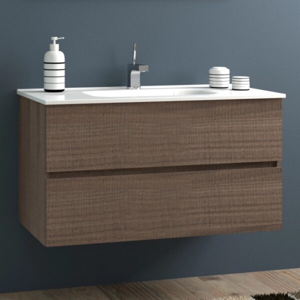 Mobile bagno moderno con mobile lavabo effetto legno e lavabo da appoggio bianco.